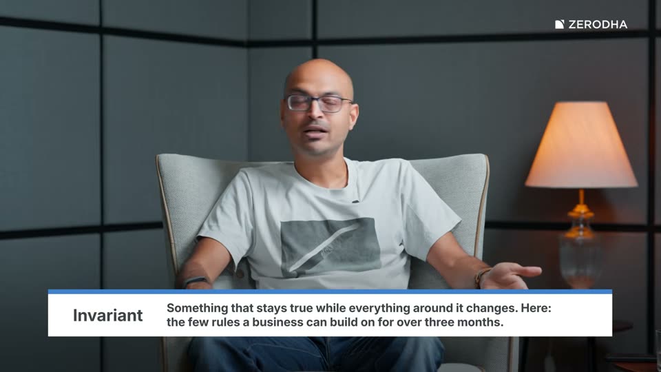 On-screen card: Invariant. Something that stays true while everything around it changes. Here: the few rules a business can build on for over three months.