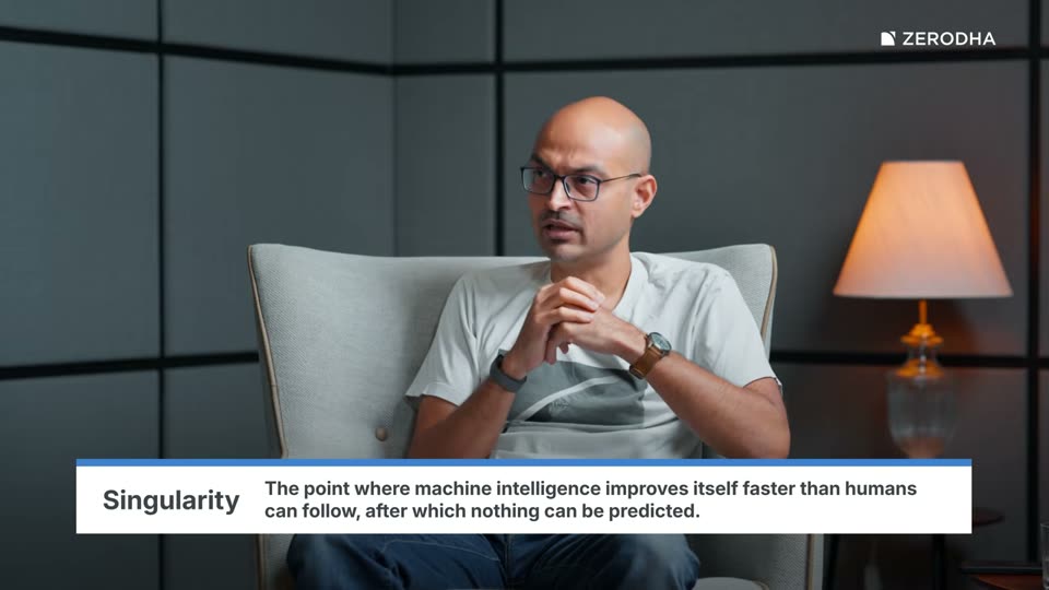 On-screen card: Singularity. The point where machine intelligence improves itself faster than humans can follow, after which nothing can be predicted.