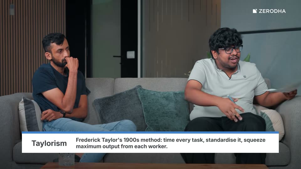 On-screen card: Taylorism. Frederick Taylor's 1900s method: time every task, standardise it, squeeze maximum output from each worker.